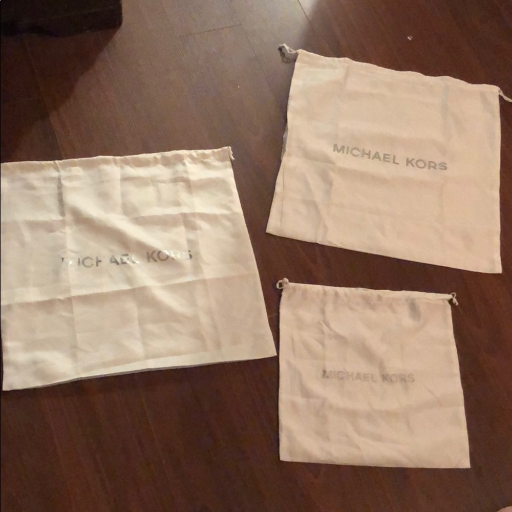 3 Michael Kors dust bags- never used